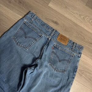 Vintage 1996 Levi's 550 Relaxed‎ Fit Tapered Orange Tab Light Wash Denim Jeans